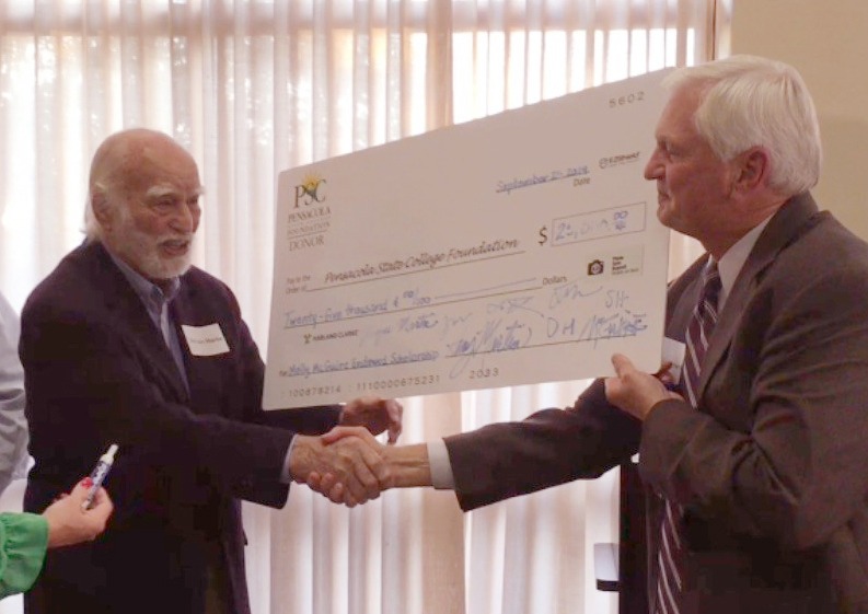 The Irish Politicians Club, a social club based at McGuire’s Irish Pub, presented a $35,000 check to the College for the scholarship fund, which began in June 2015. Then McGuire Martin presented a $25,000 check to the endowment scholarship fund named for his late wife, who died in 2014.