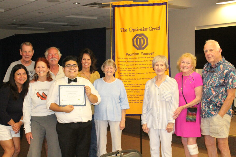 Pensacola State College Foundation Event Group photo of The Optimist Club members with PSC student supporter.