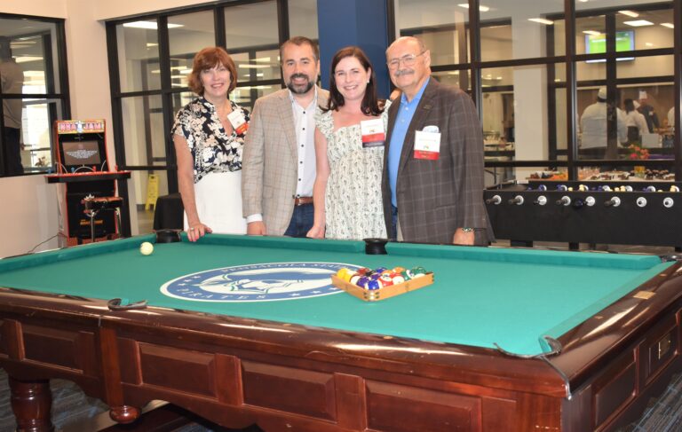 MAIN PHOTO O’Connor Family at Pool Table decorative image of MAIN-PHOTO-OConnor-Family-at-Pool-Table , PSC Student Activities Game Room officially opens with help of generous donors 2023-07-27 10:19:28