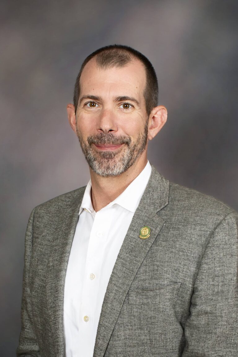 Decorative image of Mike Morette.