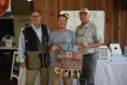decorative image of Drop-in-the-Bucket-Winner-Matthew-Cook-with-Ron-Jackson-and-Ed-Meadows-1-scaled , Day of Clays 2025 2025-10-09 17:45:22